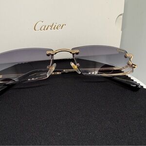 Cartier Gold and Black Rimless Eyewear